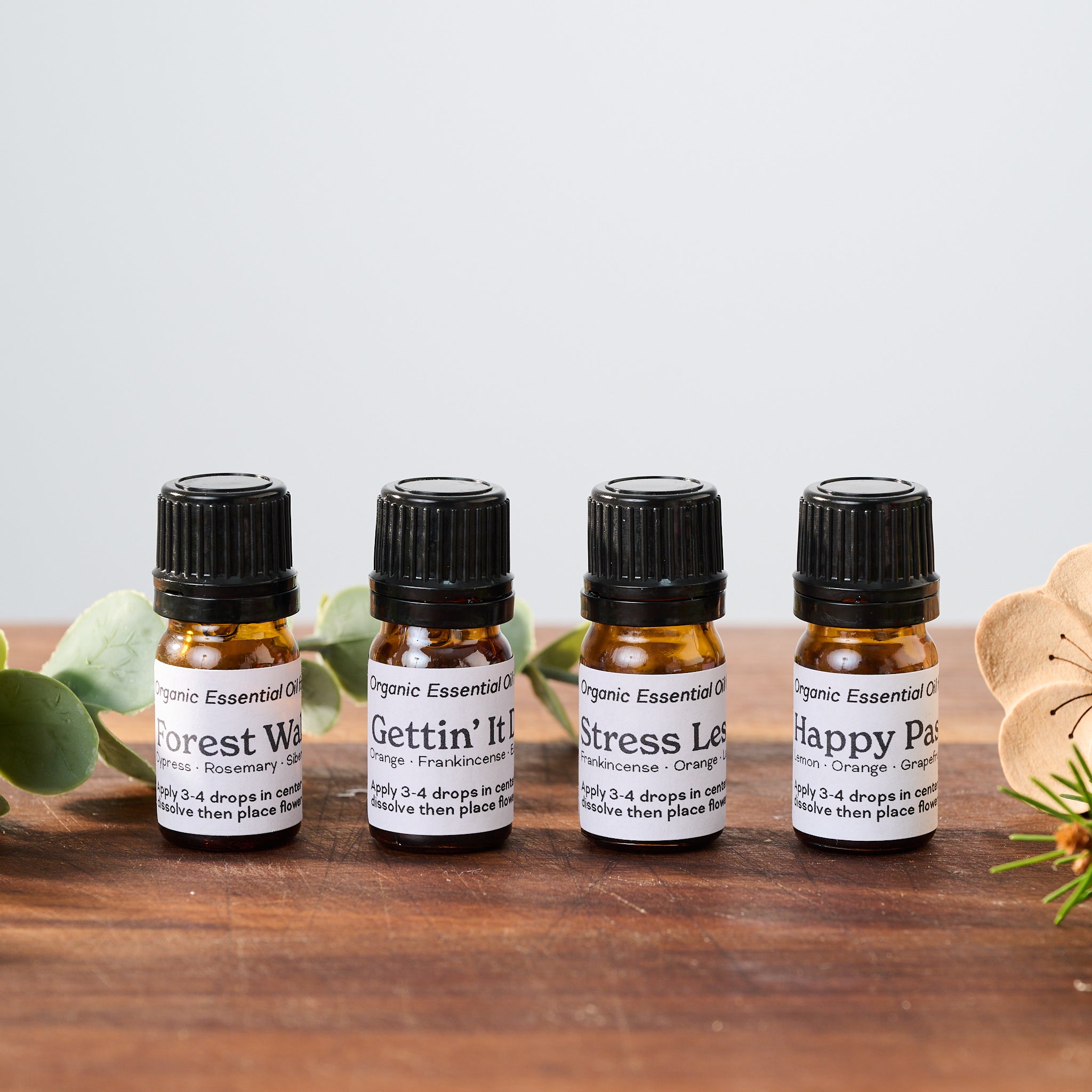 All four organic essential oil blends for our car diffusers.