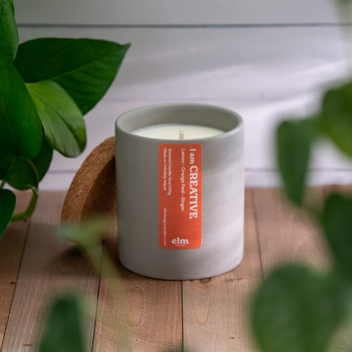 Elm Design's 12 ounce soy candle in our CREATIVE scent.
