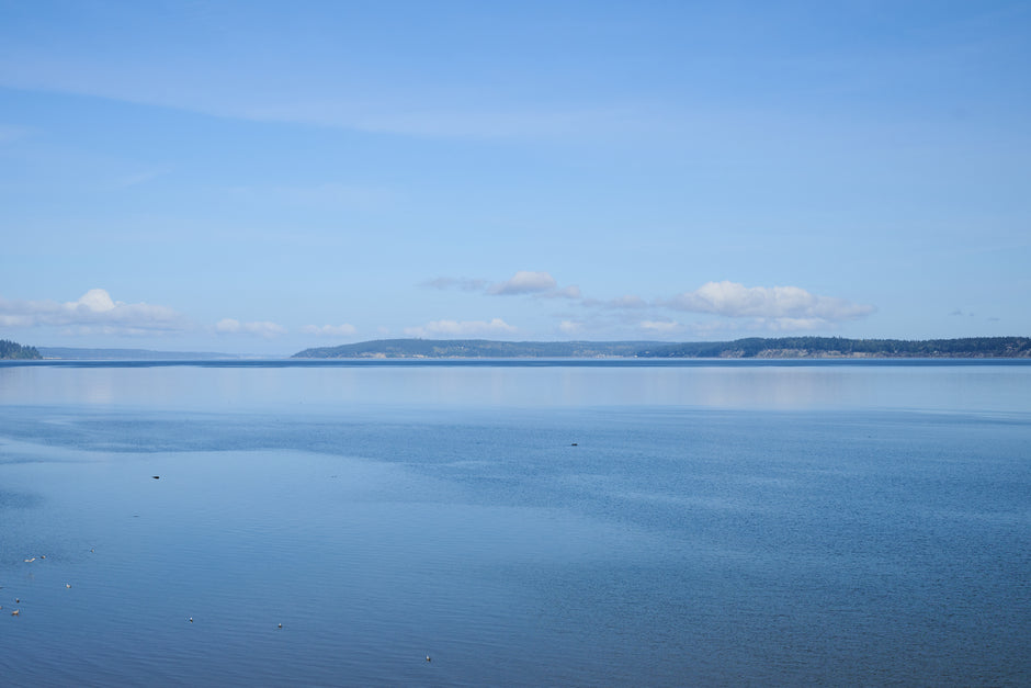 a picture of Whidbey Island and the water in front