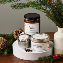 Load image into Gallery viewer, Elm Design&#39;s Cozy Cabin scented candle in 8oz, 6oz, &amp; 2oz sizes.
