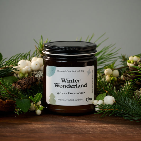 Elm Design's scented candle "Winter Wonderland" in an 8oz glass jar.