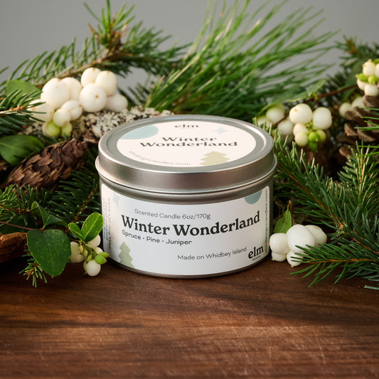 Elm Design's scented candle "Winter Wonderland" in a 6oz metal tin.