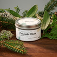 Load image into Gallery viewer, Elm Design's scented candle "Cascade Pines" in a 6oz metal tin.
