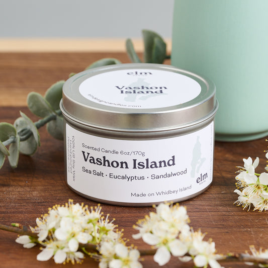 Elm Design Candles scented candle in Vashon Island scent in 6oz metal tin.