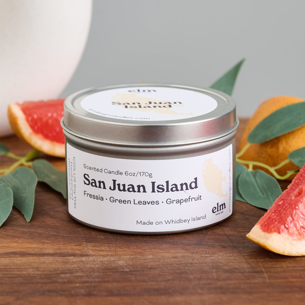 Elm Design Candles scented candle in San Juan Island scent in 6oz metal tin.