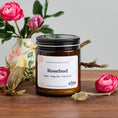 Load image into Gallery viewer, Elm Design Candles' scented candle Rosebud in an 8oz amber glass jar.
