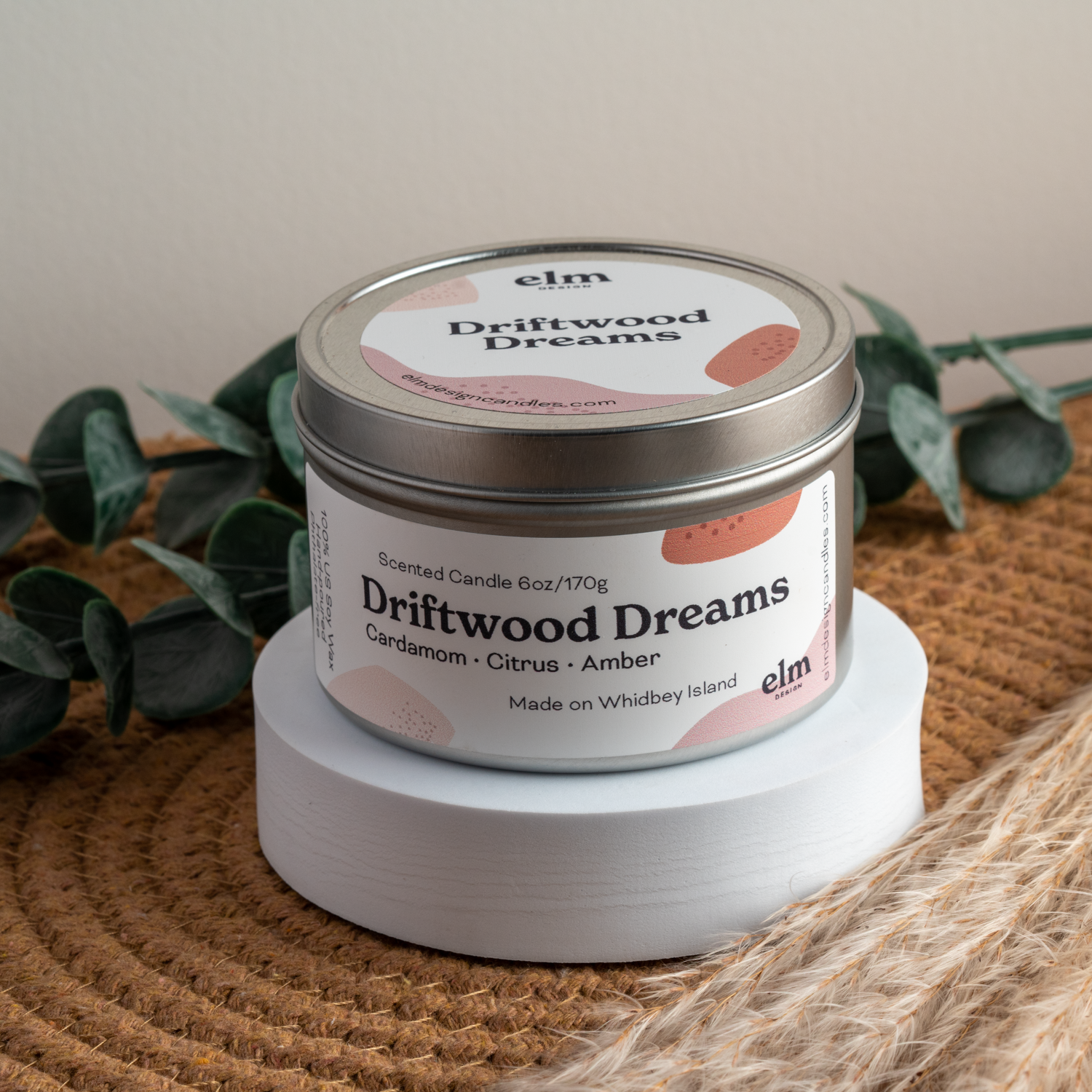 Driftwood Dreams scented soy candle in colorfully labeled 6 oz container.