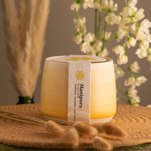 20oz Solar Chakra scented soy candle, in a hand crafted yellow Briggs Shore ceramic vessel.