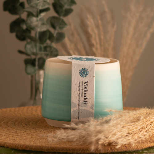 20oz Throat Chakra scented soy candle, in a hand crafted teal Briggs Shore ceramic vessel. 